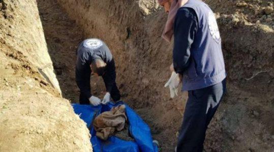 At least 14 bodies exhumed from ISIS mass grave in Raqqa