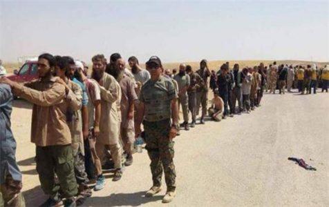 Hundreds of ISIS terrorists surrender to the Kurdish forces in eastern Syria