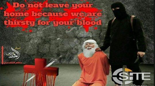 ISIS terrorist group supporters posted a picture of Father Christmas kneeling in front of a jihadist