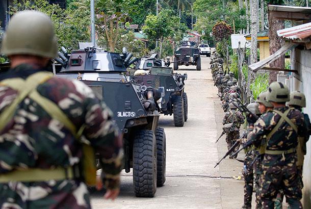 ISIS-linked terrorists kill 9 soldiers in Philippine’s Marawi town ...