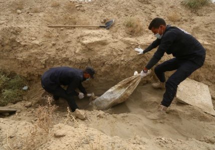 Six victims of Islamic State in execution suits found in Syria mass grave