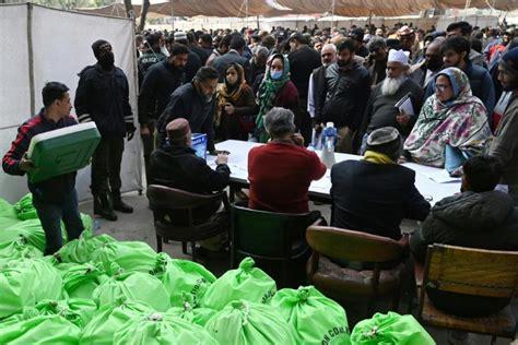 Twin bombings at Pakistan political offices kill dozens on election eve