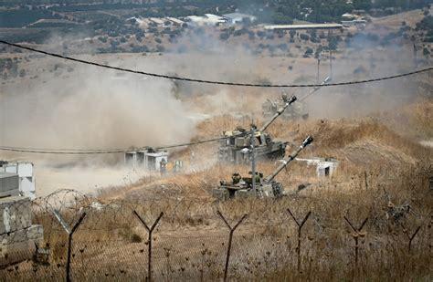 Hezbollah fires dozens of rockets at northern Israel as IDF strikes deep in Lebanon