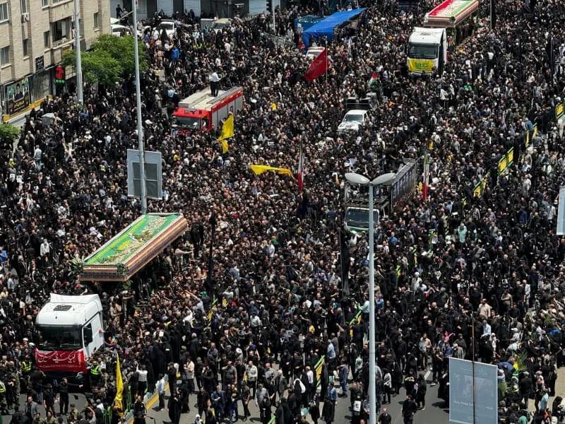 Supreme Leader and Hamas chief at funeral ceremony for Iranian president