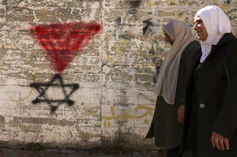 Berlin bans Hamas red triangle used to target Jews, supporters of Israel