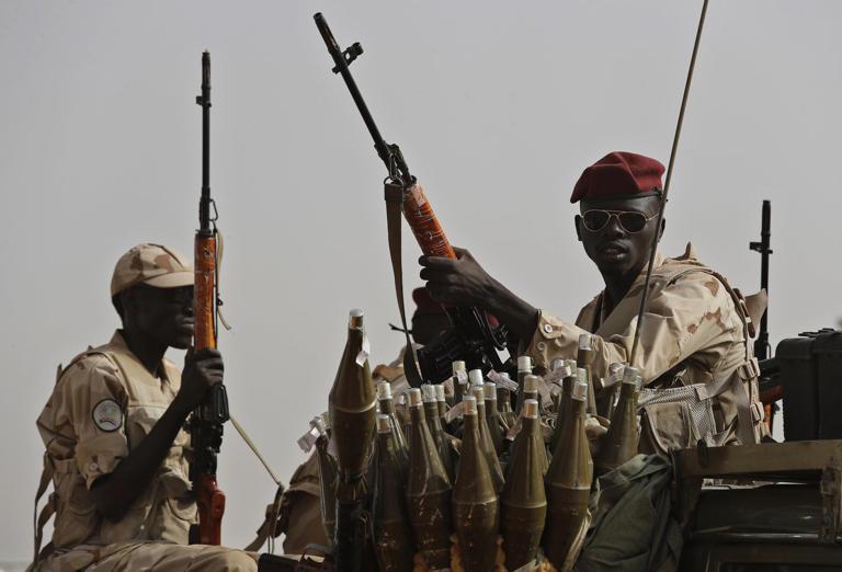 Looting and fighting reported in a central Sudan city as paramilitary group attacks military troops