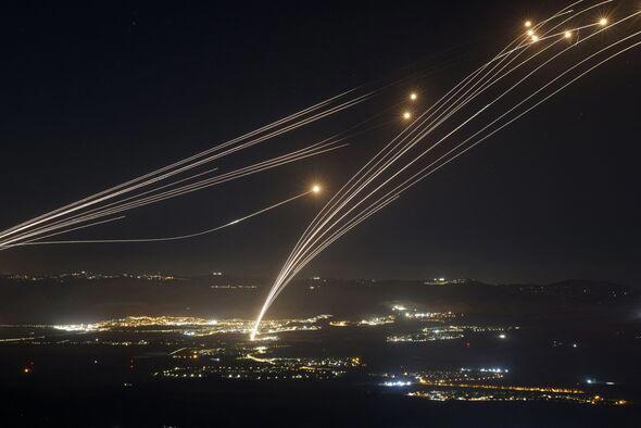 Hezbollah fires dozens of rockets at Israel as full-blown war fears explode