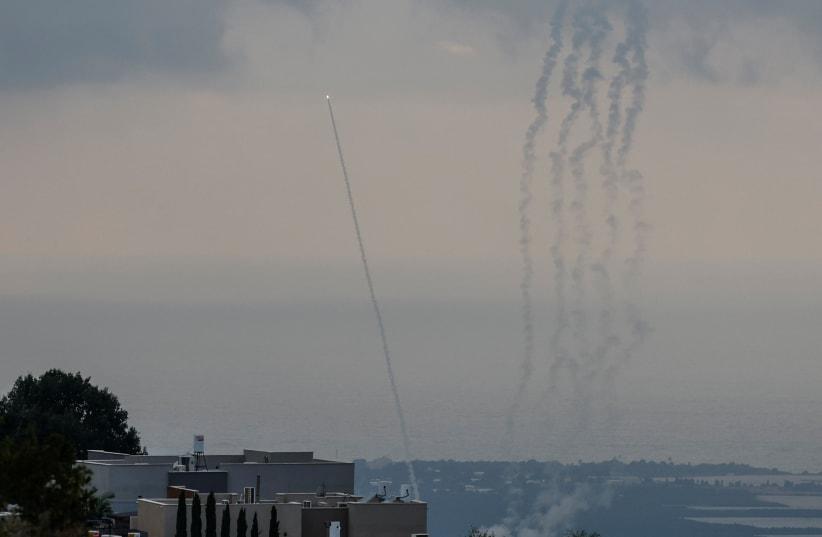 Hezbollah rockets wound several, damage property in 80-rocket barrage